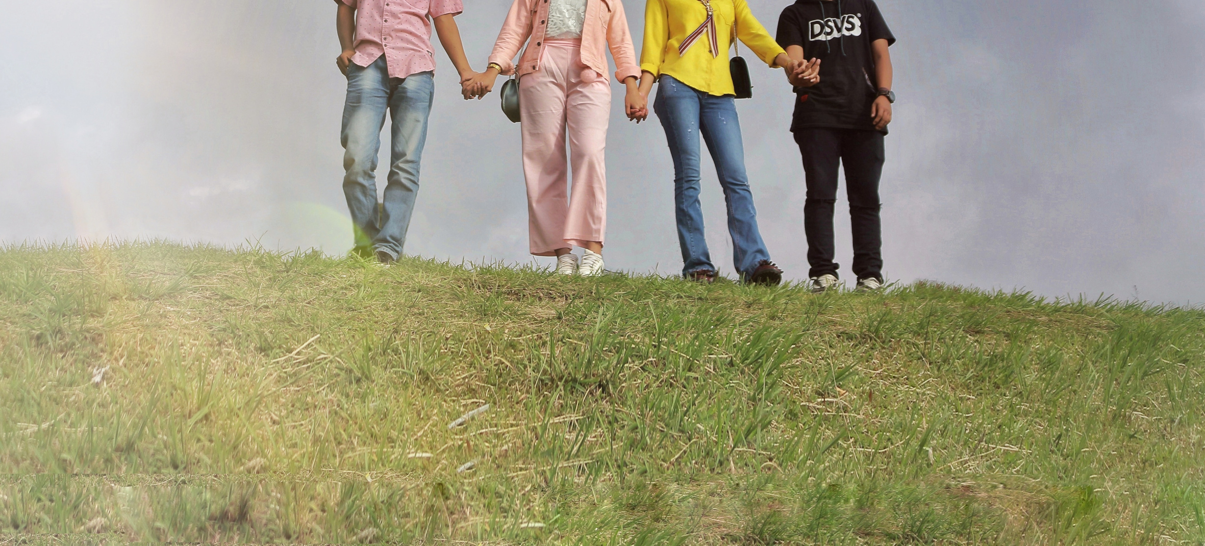 Crop friends standing on hill